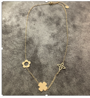 collier doré croix et fleur