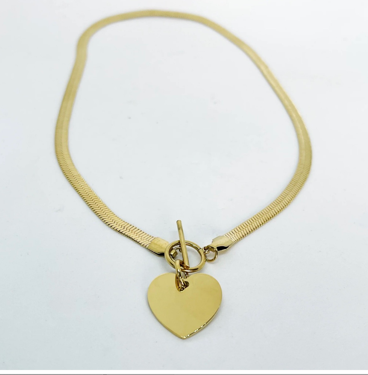 Collier dore maille plate et coeur