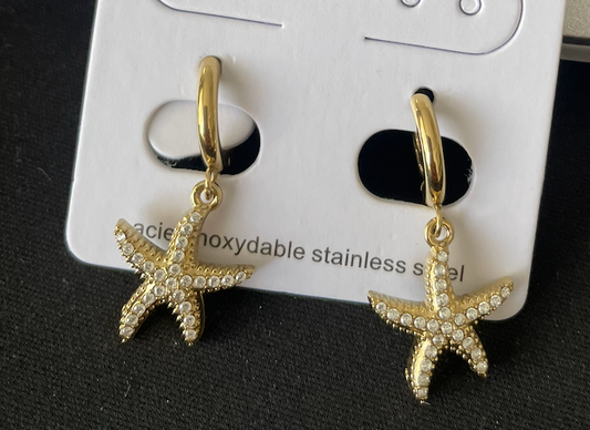 boucle oreille dore étoile mer strass