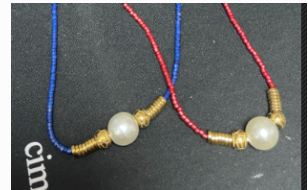 Collier bleu rouge avec perle