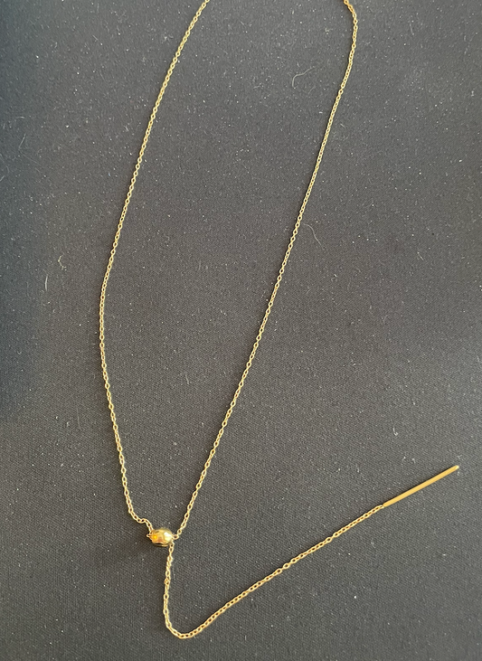 collier doré fin boule