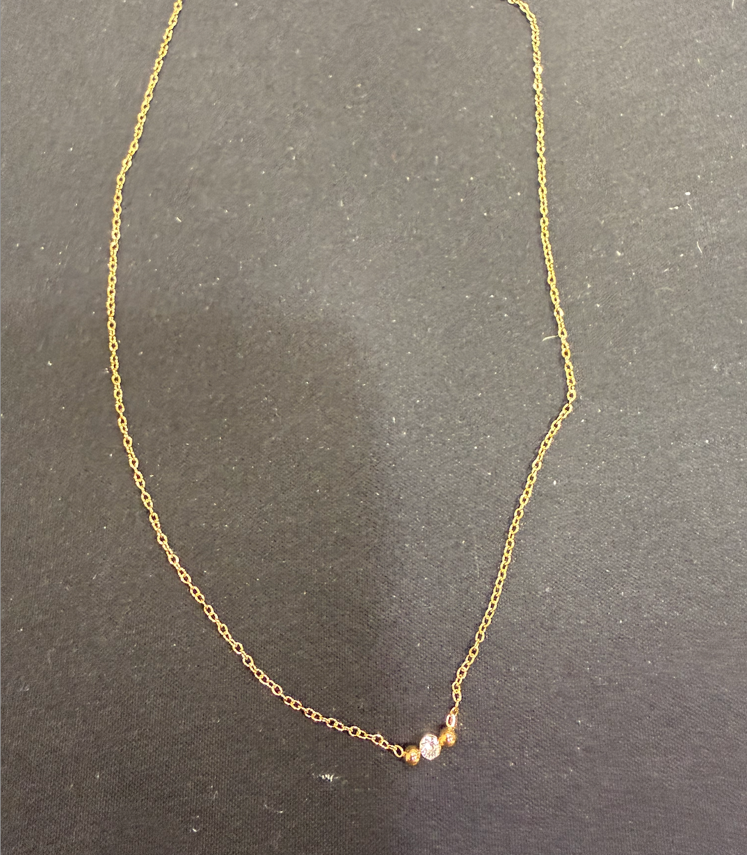 collier doré fin boule dore et strass