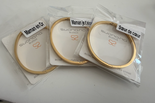 bracelet rigide dore fermé message