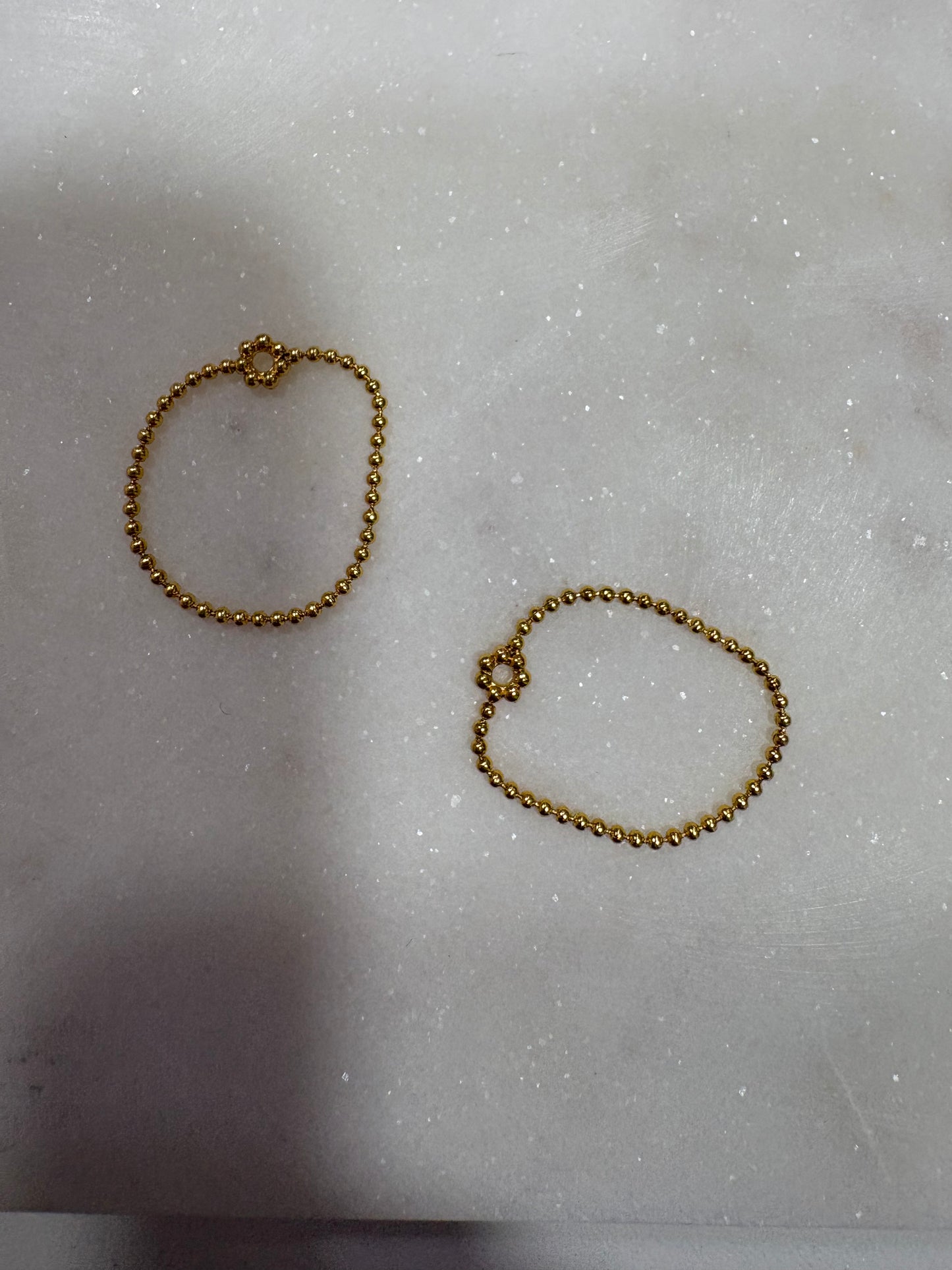 bague doré boule et fleur