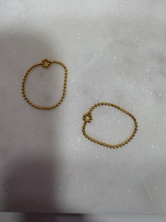 bague doré boule et fleur